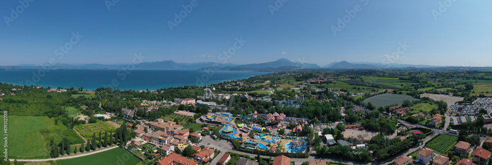 Amusement park, attractions on Lake Garda in Italy, aerial view. Aerial panorama of the popular Amusement Park on Lake Garda aerial view. Attractions in Italy.