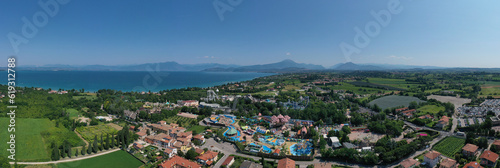 Amusement park  attractions on Lake Garda in Italy  aerial view. Aerial panorama of the popular Amusement Park on Lake Garda aerial view. Attractions in Italy.