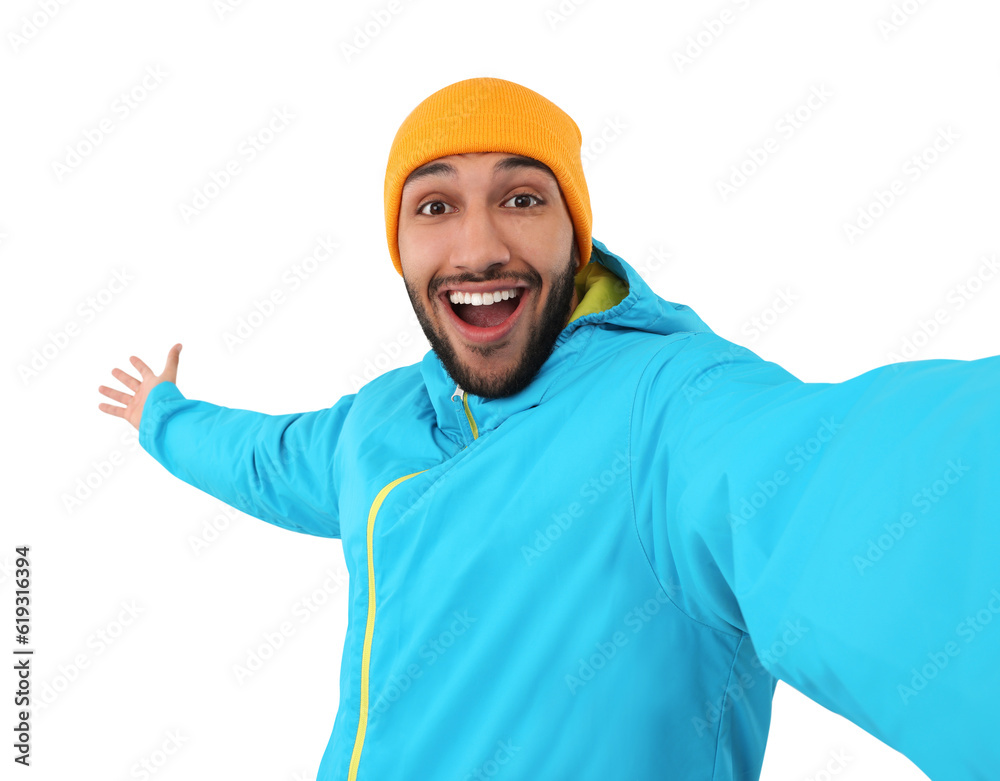 Smiling young man taking selfie on white background Smiling young man taking selfie on white background