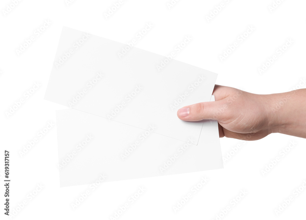 Obraz premium Woman holding flyers on white background, closeup. Mockup for design