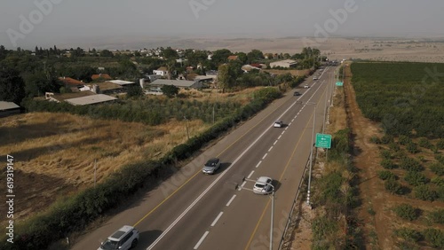 Living Panorama: Car amidst Green Fields