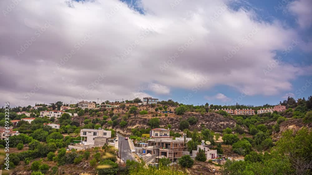 Timelapse shot of town houses along hilly slope from Pikni forest viewpoint, Cyprus on a cloudy day. Timelapse shot of town houses along hilly slope from Pikni forest viewpoint, Cyprus on a cloudy day.