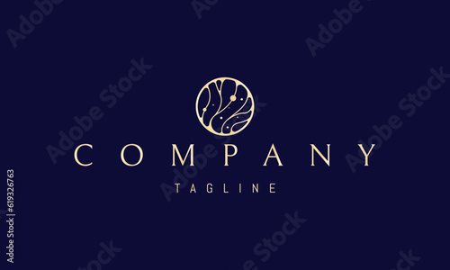Vector golden logo on which an abstract image of a wave pattern in a circle.