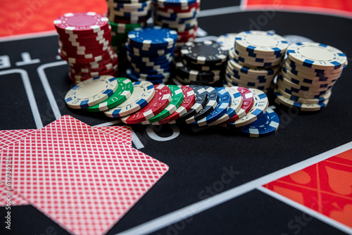 Playing cards with a winning combination with chips at casino table