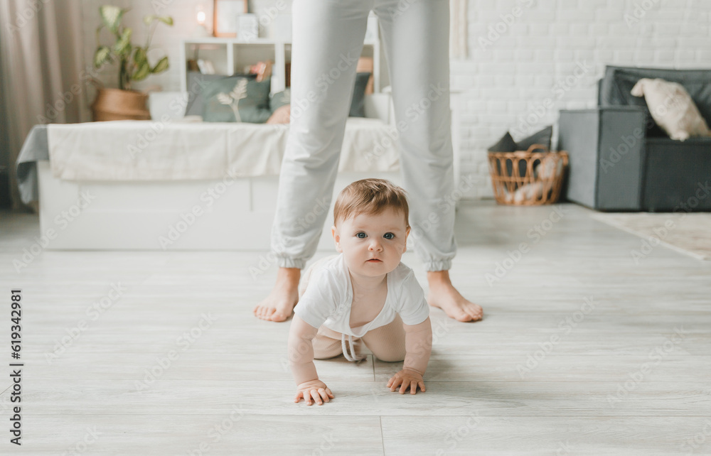 crawling baby 6 months in the nursery at home. crawling baby 6 months in the nursery at home.