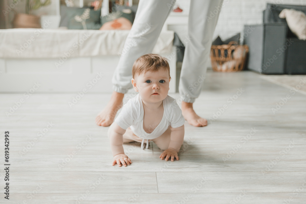 crawling baby 6 months in the nursery at home. crawling baby 6 months in the nursery at home.