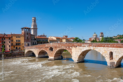 old roman bridge in Verona spans the river Etsch