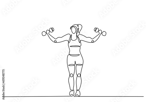 Woman exercise with dumbbel...