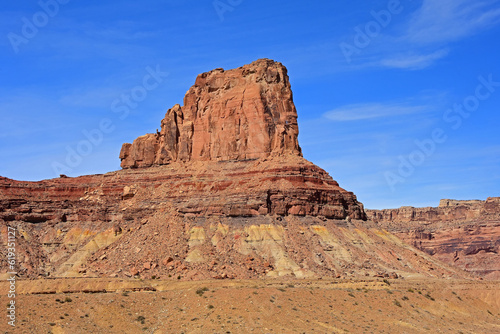 the colorful red rock  butte of  assembly hall peak  on a sunny winter day  along the buckhorn draw scenic backway in the northern san rafael swell near green river   utah 
