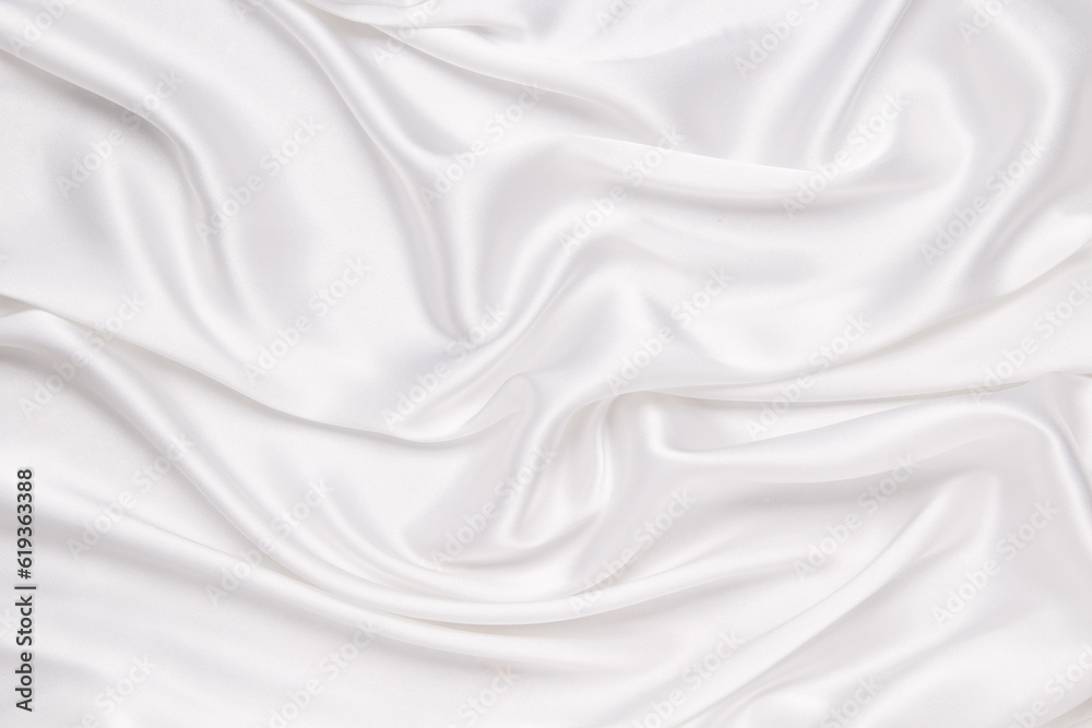 Abstract white fabric texture background. Cloth soft wave. Creases of satin, silk, and cotton. Abstract white fabric texture background. Cloth soft wave. Creases of satin, silk, and cotton.