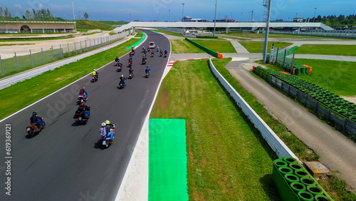 driving school. aerial view of a race track open for motorcycle training. drone footage. A group of motorcyclists. Moto sport. Italy Misano 20.07.2023