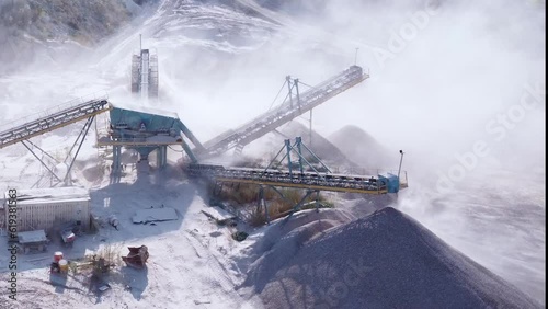 Stone crusher with conveyor lines for sorting gravel.