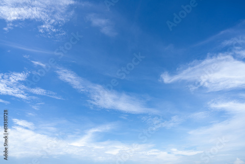 Blue sky and white cirrocumulus clouds texture background. Blue sky on sunny day. Summer sky. Cloud formation. Fluffy clouds. Nice weather in summer season. Weather pattern. Atmospheric phenomenon.