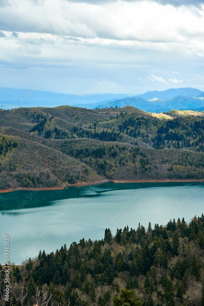 Smaller section of Lake Plastiras surrounded by green hills. Karditsa, Greece.