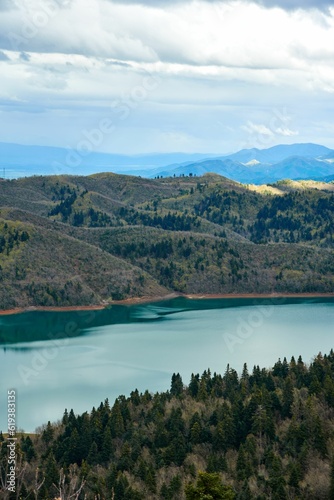 Smaller section of Lake Plastiras surrounded by green hills. Karditsa, Greece.