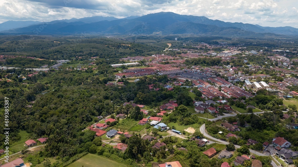 Aerial view of Kuala Kangsar town near the mountains in Malaysia.
