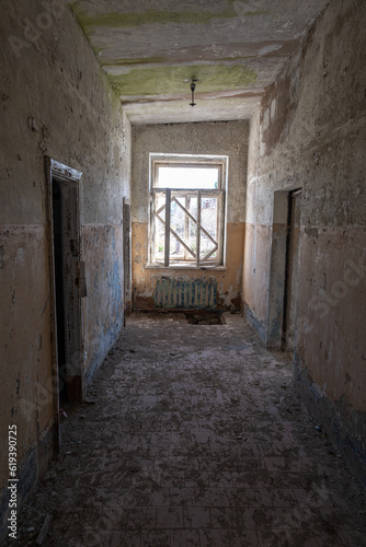 Old ruined building from inside with time destroied interior and dirty floor