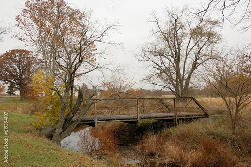 Old bridge over a narrow river. Wood County  Ohio.