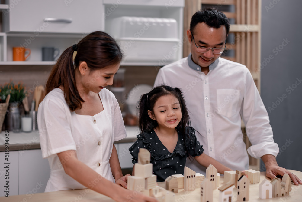 Parents teach values to their daughter and develop efficient habits via hardwood toys to save for future housing. Guided and inspired learning and supportive encouragement to build lifelong character Parents teach values to their daughter and develop efficient habits via hardwood toys to save for future housing. Guided and inspired learning and supportive encouragement to build lifelong character