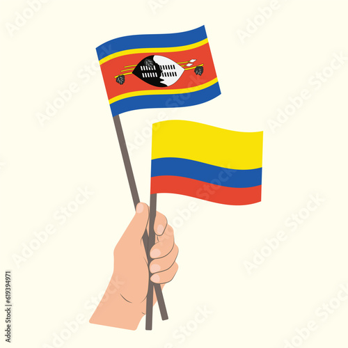 Flags of Eswatini and Colombia, Hand Holding flags