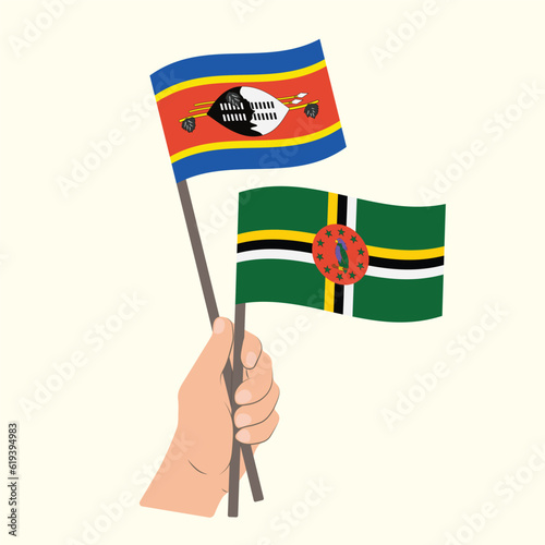 Flags of Eswatini and Dominica, Hand Holding flags