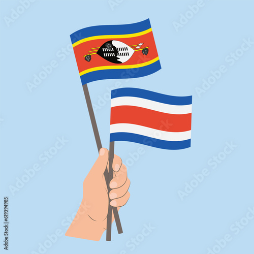 Flags of Eswatini and Costa Rica, Hand Holding flags