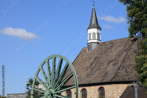 Wattenscheid, district of Bochum city in Germany. Evangelical protestant church and former coal mine elements. photo