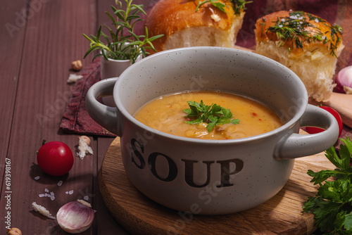 Chickpea-tomato cream soup with fragrant garlic buns. Comfort food, nostalgic mood concept