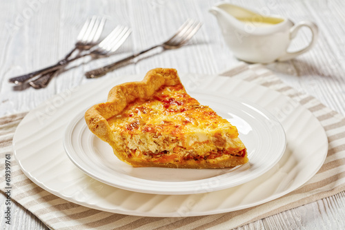 quiche with cheese and bacon filling on plate