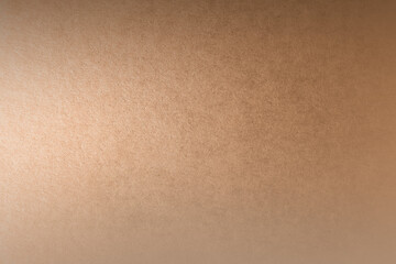 Bright natural soft light brown tone color gradation paint on recycled cardboard box blank environmental friendly paper texture background minimal style with space