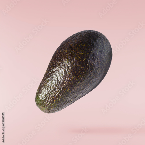 Fresh ripe avocado falling in the air isolated © Agave Studio