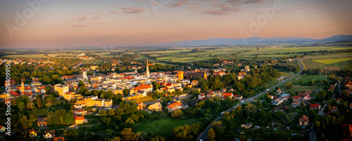 Zabkowice Slaskie, aerial panorama of small town in Lower Silesia, Town hall, Leaning tower (Krzywa Wieza) of Zabkowice sl.,Poland, sunset in late spring.
