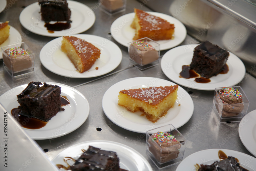 Various desserts served in a buffet line Various desserts served in a buffet line