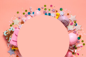 Composition with decoration party on a pastel pink colorful background top view