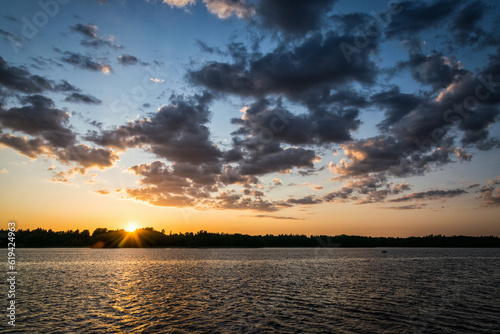 Idyllic sunrise over the Swedish lake photo