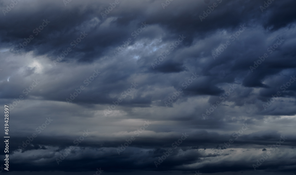 storm sky, dark dramatic clouds during thunderstorm, rain and wind, extreme weather, abstract background storm sky, dark dramatic clouds during thunderstorm, rain and wind, extreme weather, abstract background
