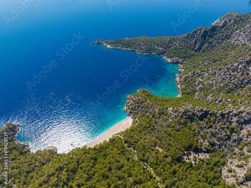 Fototapeta Naklejka Na Ścianę i Meble -  Balarti Cennet Bay is located on the border of Fethiye district of Muğla province. The waters of Cennet Bay are very clean and clear.