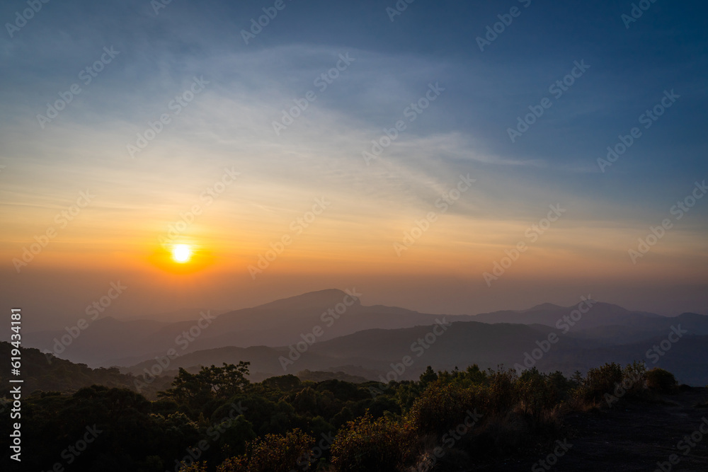Beautiful landscape of the sunrise viewpoint which is the highest mountain of Thailand in the morning of the winter season at Doi Inthanon National Park, Chiang Mai, Thailand.