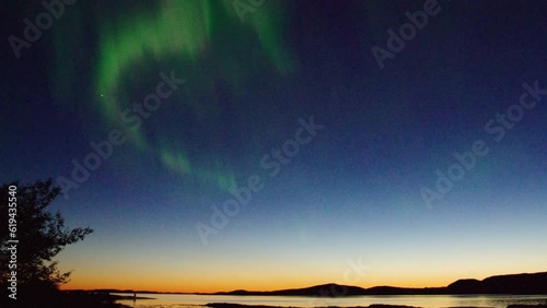 Northern Lights in real time, Aurora borealis, Evening Red, Helgeland, Kystriksveien, Nordland, Norway, Europe photo