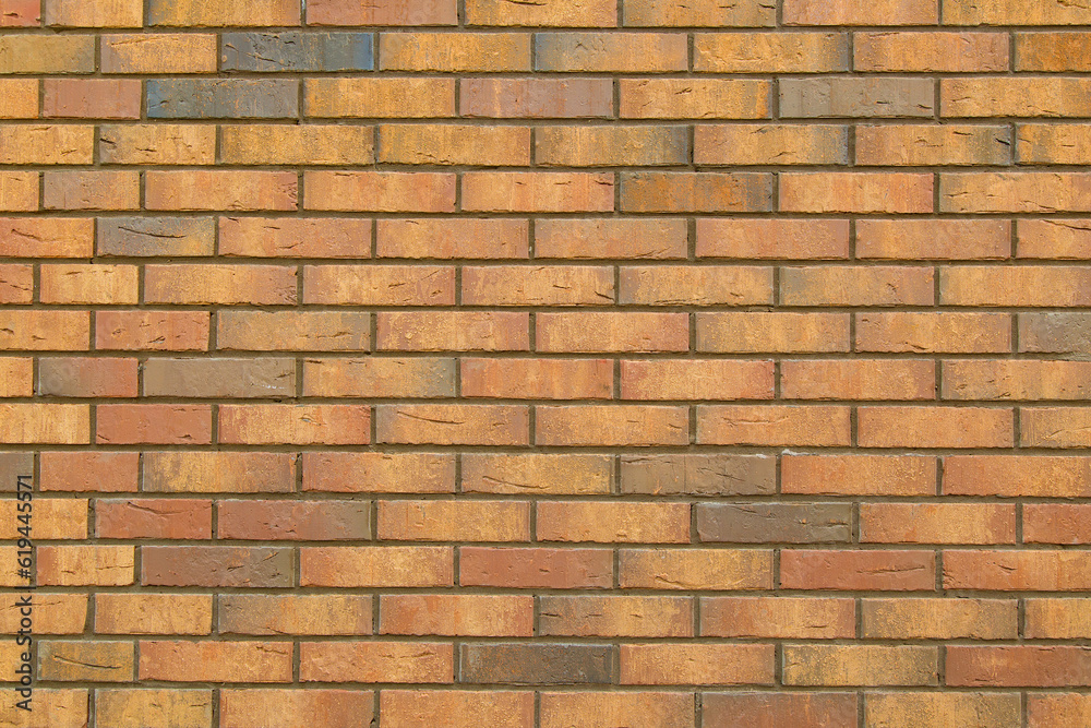 Obraz premium Section of a wall built of brown bricks in a retro style