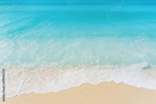 white sand beach background with turquoise sea water and small waves making white foam. summer  vacation  tropical and relax concept. top view