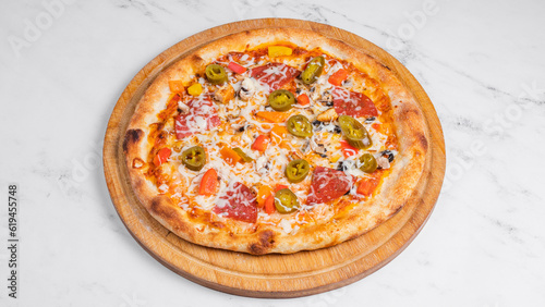 Pizza with sausage, pickled pepper and grated cheese