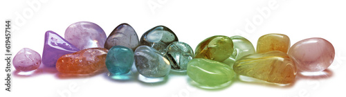 A selection of  chakra multi colored tumbled healing crystal semi precious gem stones isolated transparent png file