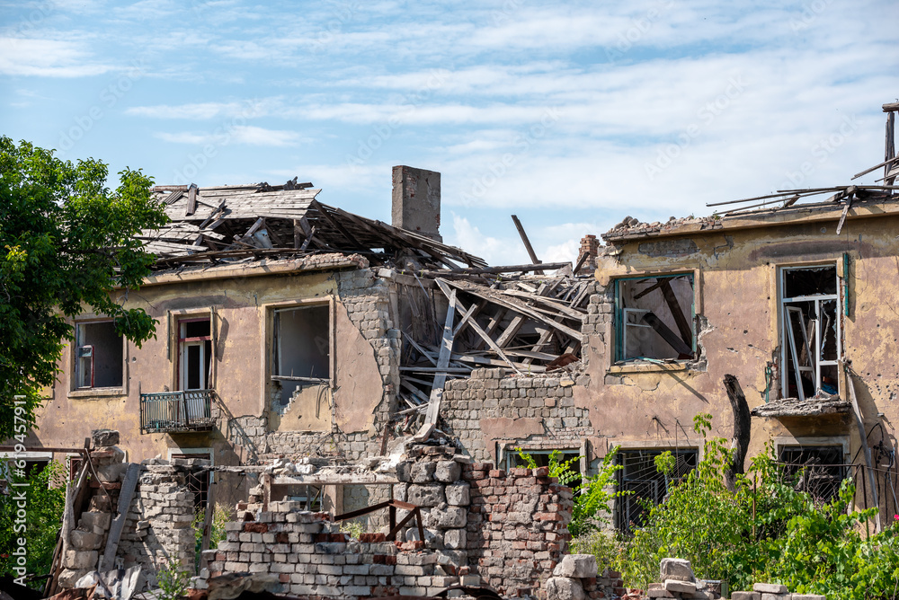 destroyed houses in an abandoned city without people in Ukraine destroyed houses in an abandoned city without people in Ukraine
