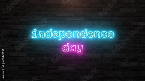 Independence day with neon text effect in wall background. Seamless looping video