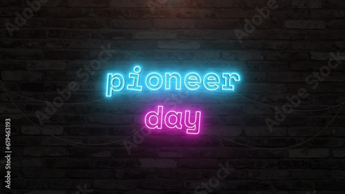 Pioneer day with neon text effect in wall background. Seamless looping video