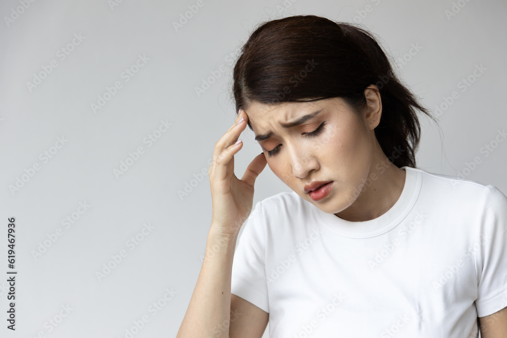 Stressed Asian Woman with Headache, Managing Stress and Finding Relief for Headache Pain Stressed Asian Woman with Headache, Managing Stress and Finding Relief for Headache Pain