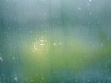 Close up water rain drop stain on window glass abstract background image