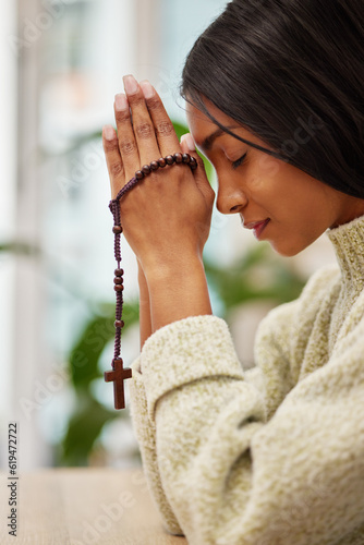 Fototapeta Praying, hands and Indian woman with a rosary in her home for worship, praise and gratitude to God