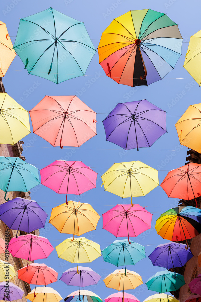 Umbrellas Suspended and Joined with Each other to Form a Roof of Colorful Umbrellas Umbrellas Suspended and Joined with Each other to Form a Roof of Colorful Umbrellas